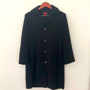 Fabulous Gallery Raincoat. Hooded. Fully lined. Four button front.